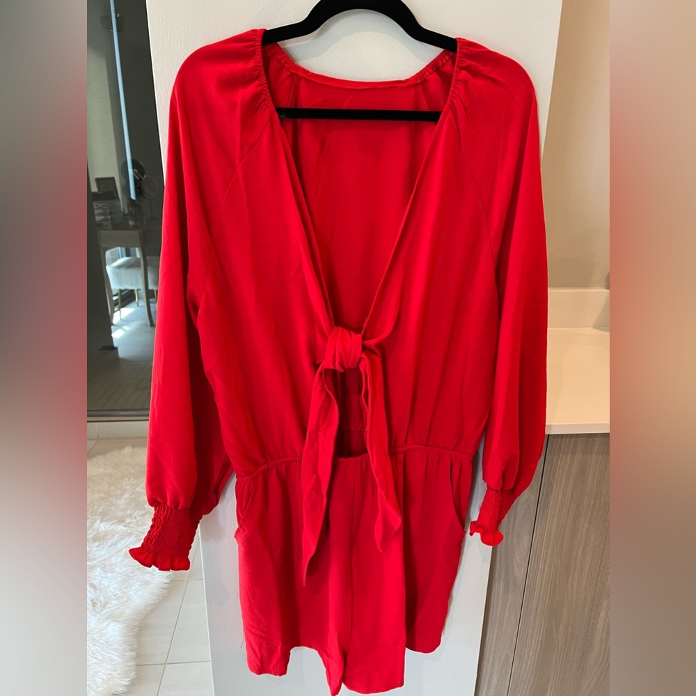 Red tie front romper, elastic cuff sleeve. Size large